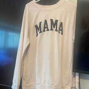 Cream long sleeved shirt that says mama in black lettering